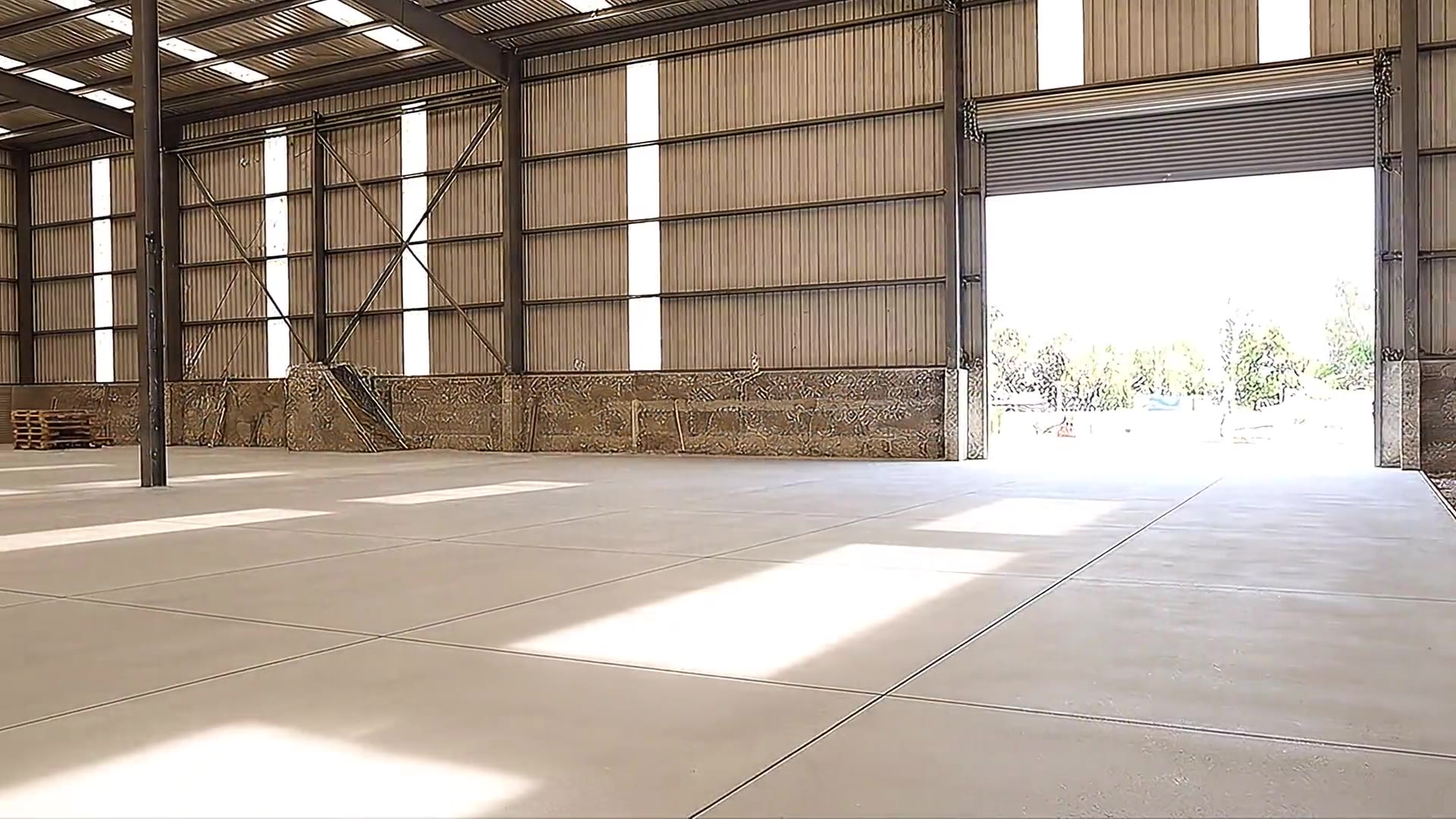 Finished warehouse concrete floor, illustrated by a frame from the installation timelapse